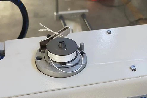 Built-in Bobbin Winder Built-in Bobbin Winder